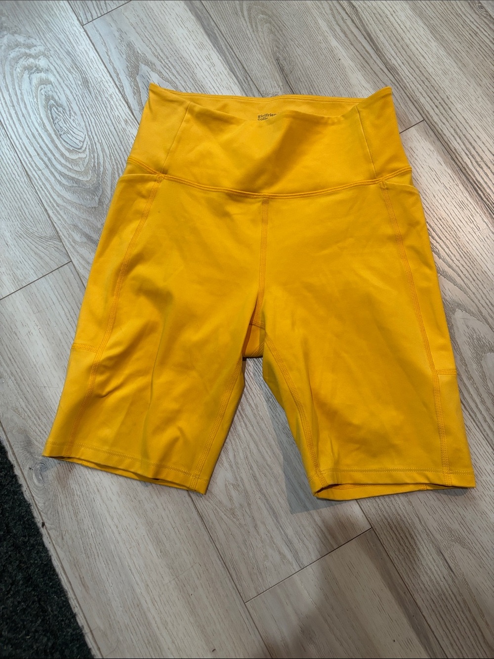 girlfriend collective Bright Yellow High-Rise Bike Shorts with pockets